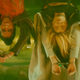 Yaz (Mandip Gill) and the Doctor (Jodie Whittaker) hang upside down, handcuffed, in a scene from Doctor Who: Flux.